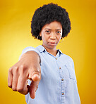 Hand, pointing and portrait of black woman in studio for you, choice or deciding on yellow background. Face, emoji and finger of suspicious lady with warning, guilty or blame, sign or accountability