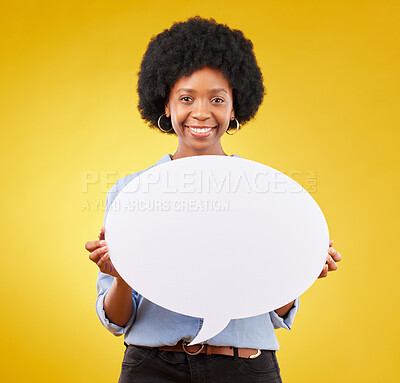 Buy stock photo Portrait, speech bubble and happy black woman in studio with mockup for social media, advertising or space. Face, poster and girl with billboard on news, announcement or branding on yellow background