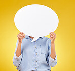 Social media, person and hands with mockup speech bubble for opinion, marketing space or brand advertising. Product placement info, studio billboard and woman with voice mock up on yellow background