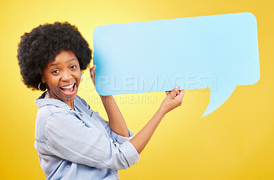 Buy stock photo Excited, speech bubble and portrait of black woman in studio with mockup for social media, advertising or space. Face, paper and happy lady with billboard for news or poster on yellow background