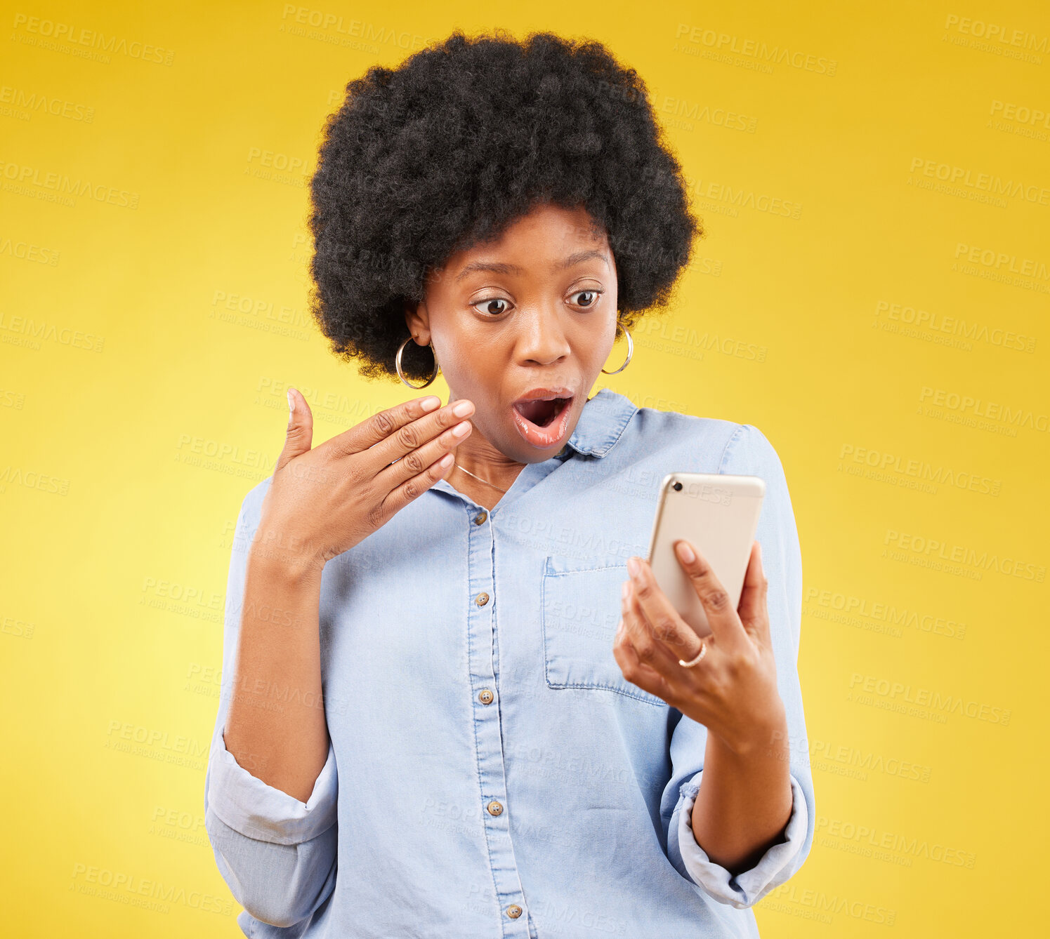 Buy stock photo Phone, surprise and shock of black woman in studio isolated on a yellow background. Wow, cellphone and surprised African female with smartphone for reading fake news on social media, omg or wtf emoji