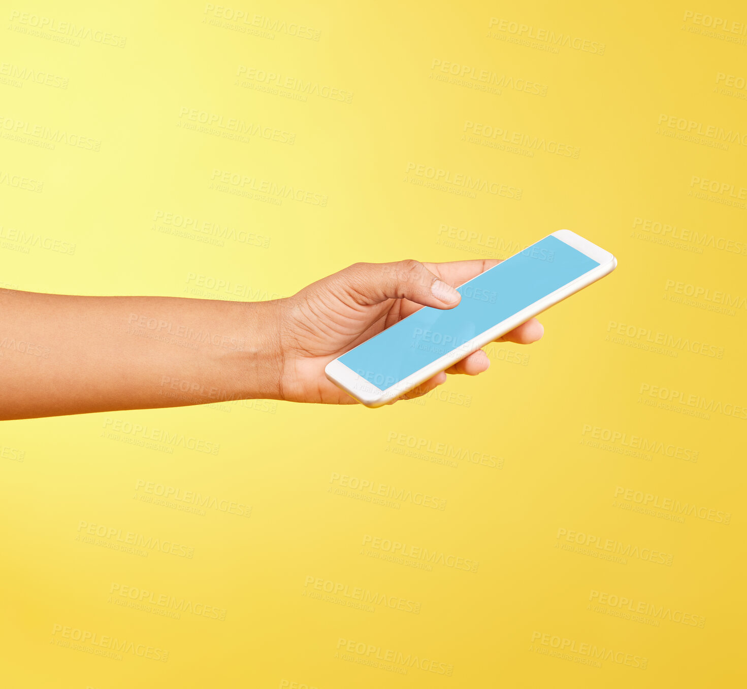 Buy stock photo Hands, phone mockup and green screen in studio isolated on a yellow background. Cellphone, social media and black woman holding mobile smartphone for advertising space, marketing or product placement