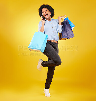 Buy stock photo Shopping bag, excited phone call and portrait black woman with sales product, discount fashion deal or mall store present. Talking, designer gift and happy customer chat isolated on yellow background