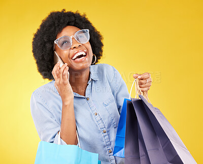 Buy stock photo Shopping bag, phone call communication or black woman with sales product, discount fashion deal or mall store present. Talking, designer gift or chic happy customer chat isolated on yellow background