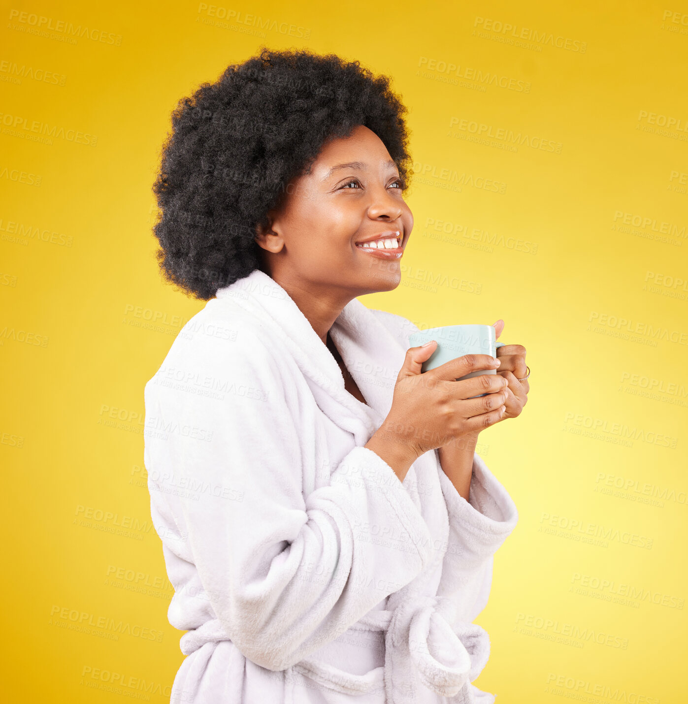 Buy stock photo Happy, coffee and relaxed black woman in studio, waking up and smile on yellow background space. Carefree, relax and female with tea in bathrobe, satisfied and cheerful, stress relief and isolated