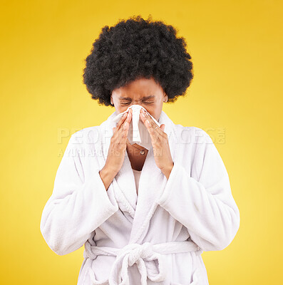 Buy stock photo Black woman, afro and sick blowing nose with tissue and morning gown against a studio background. Isolated African American female with cold, flu or symptoms for illness, covid or fever on mockup