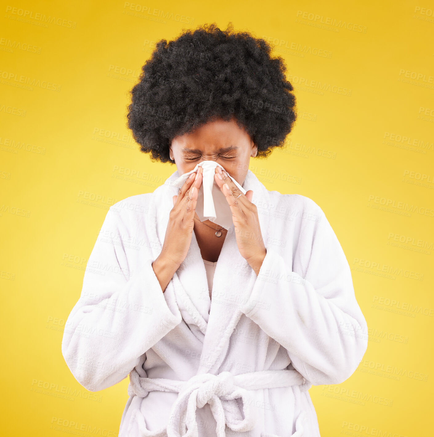 Buy stock photo Black woman, afro and sick blowing nose with tissue and morning gown against a studio background. Isolated African American female with cold, flu or symptoms for illness, covid or fever on mockup