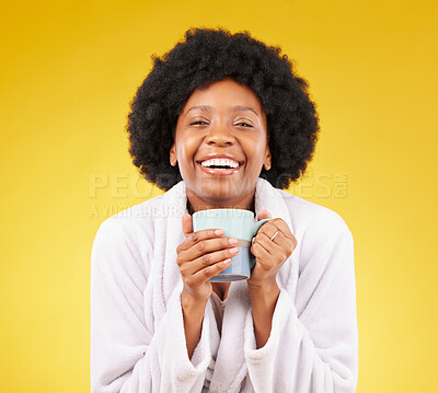 Buy stock photo Bathrobe, coffee and portrait of happy black woman in studio, waking up in the morning and smile on yellow background. Face, relax and isolated female with tea, satisfied with stress relief