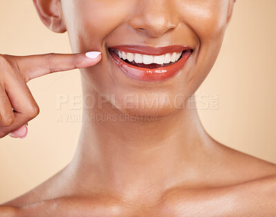 Buy stock photo Closeup, smile and mouth of woman in studio for dental, cleaning and hygiene treatment on brown background. Zoom, lips and teeth whitening for happy girl smiling after veneers, braces or oral care