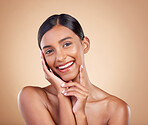 Portrait, beauty and smile a model woman in studio on a beige background for natural skincare. Face, happy and aesthetic with an attractive young female posing for cosmetics or luxury wellness