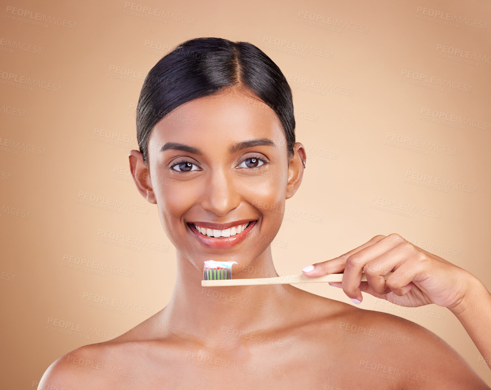 Buy stock photo Portrait, toothbrush and toothpaste with a model woman in studio on a beige background for dental or oral hygiene. Face, mouth and dentist with an attractive young female cleaning or brushing teeth