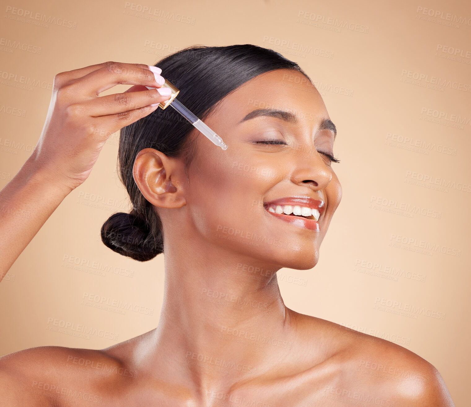 Buy stock photo Happy woman, dropper and retinol on face for beauty, skincare or cosmetics against studio background. Female model with smile applying oil drop to skin for hydration, moisturizer or facial treatment