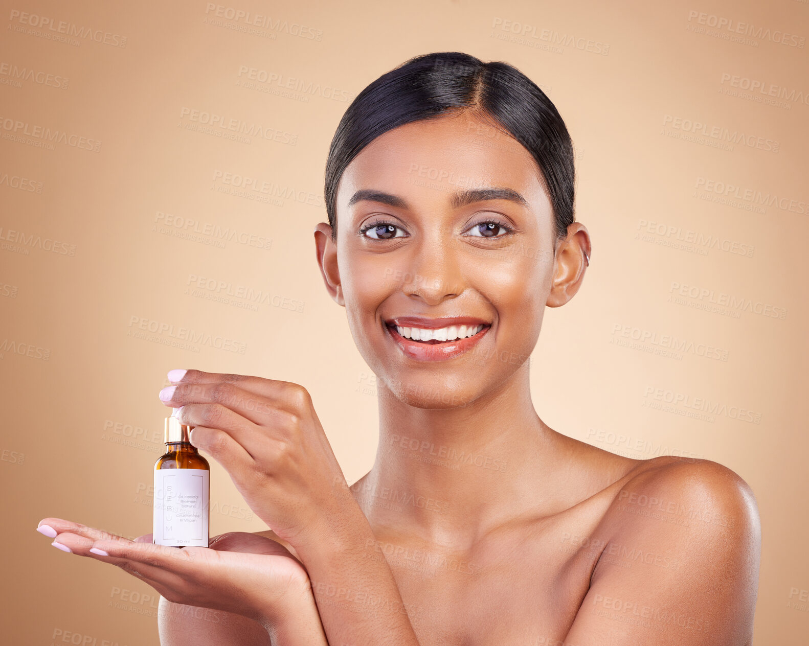 Buy stock photo Portrait, beauty and antiaging serum with a model woman in studio on a beige background to promote skincare. Face, product and collagen with an attractive young female posing for luxury cosmetics