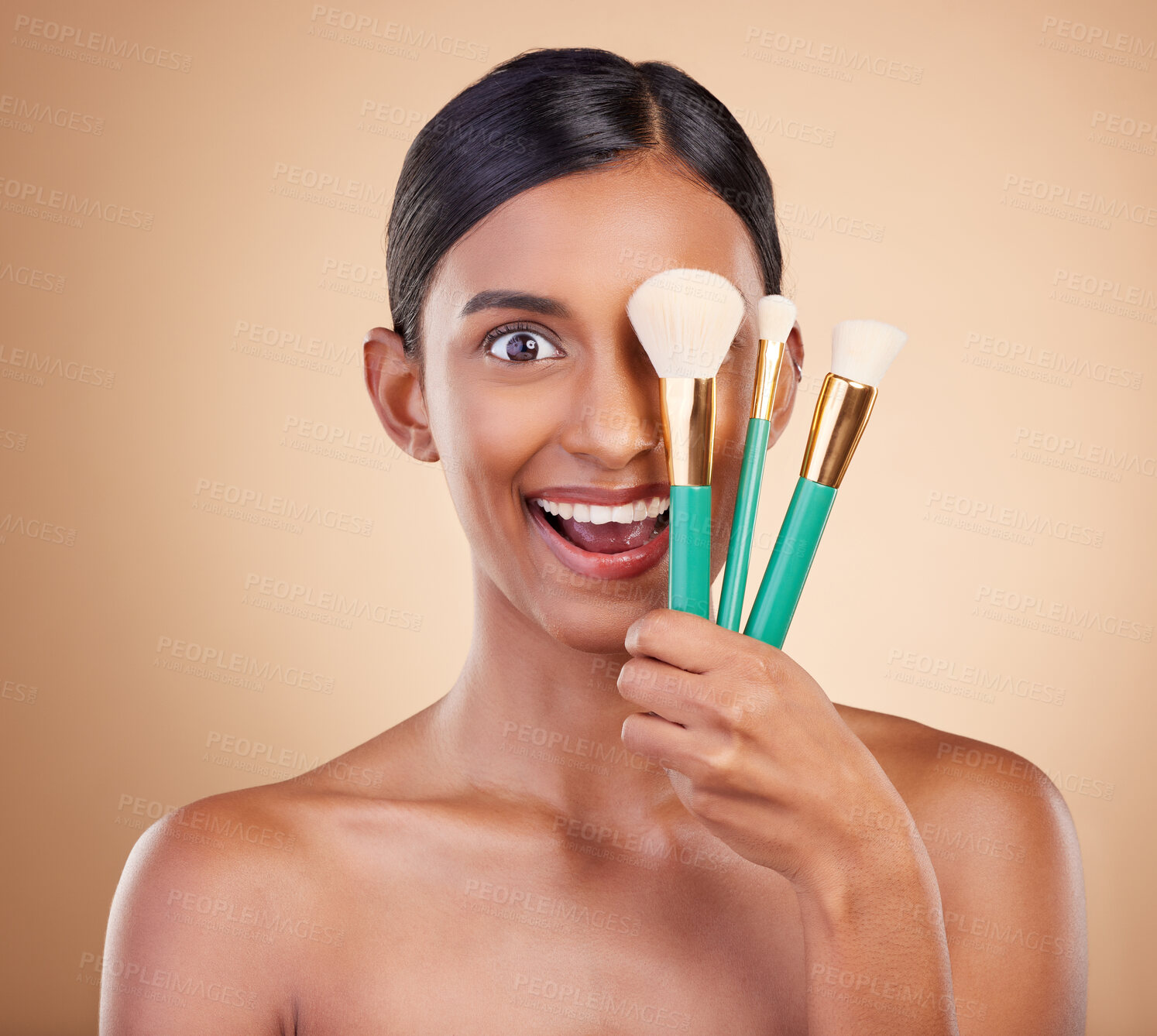 Buy stock photo Girl, brushes or makeup artist with beauty, facial products or luxury self care on studio background. Wow, happy model face or excited young Indian woman with cosmetics, glowing skincare or smile 