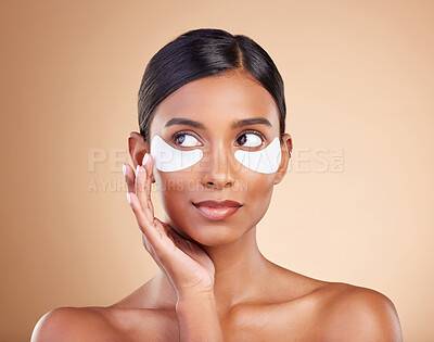 Buy stock photo Face, skincare or Indian woman with eye patch for beauty isolated on studio background. Cosmetics or girl model with facial collagen pads or dermatology product for anti aging, hydration or wellness