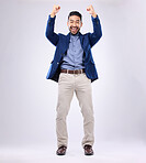 Winner, celebration and portrait of man with excited, cheering and achievement on white background. Success, winning mockup and isolated happy male with fists in air for victory, bonus and good news