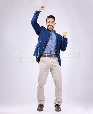 Buy stock photo Celebration, excited and portrait of man with fist in air for, happiness, success and bonus on white background. Winner, smile and isolated happy male in studio celebrate winning, good news and deal