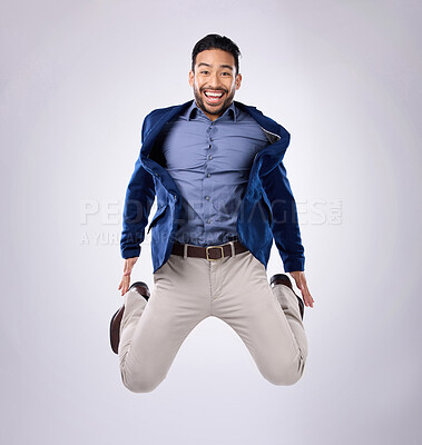 Buy stock photo Jump, excited and portrait of man in studio with surprise, happiness and celebration on white background. Winner, success mockup and isolated happy male jumping with energy for winning, smile and joy