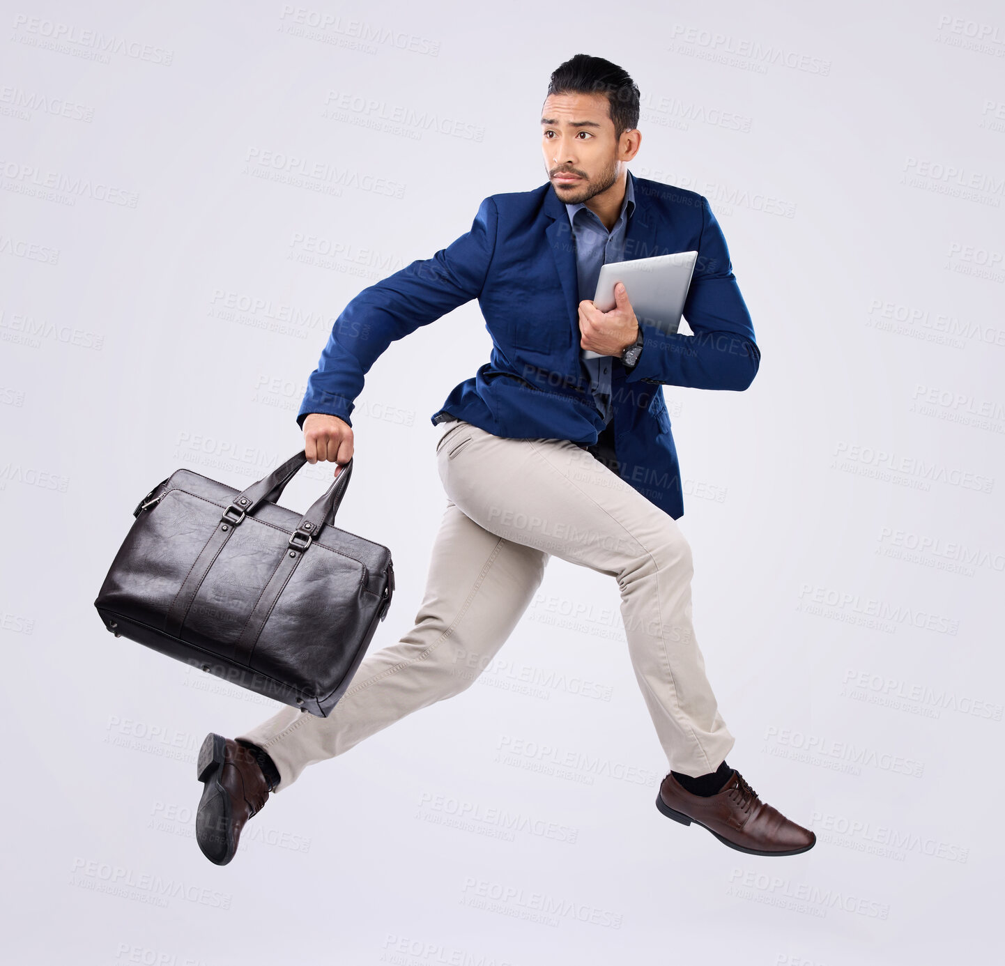 Buy stock photo Hurry, work and an Asian man jumping for business isolated on a white background in a studio. Fast, serious and a corporate Japanese businessman running in the air while late to the workplace