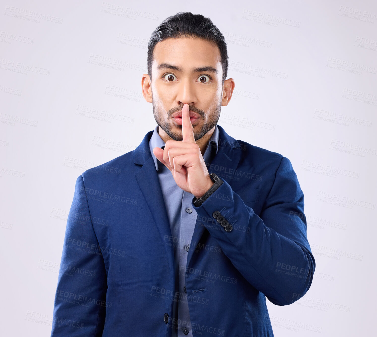 Buy stock photo Portrait, corporate man and finger on lips in studio, background and privacy secret. Male employee, silence hands and quiet mouth for shush sign, gossip or whisper in silent emoji of business mystery