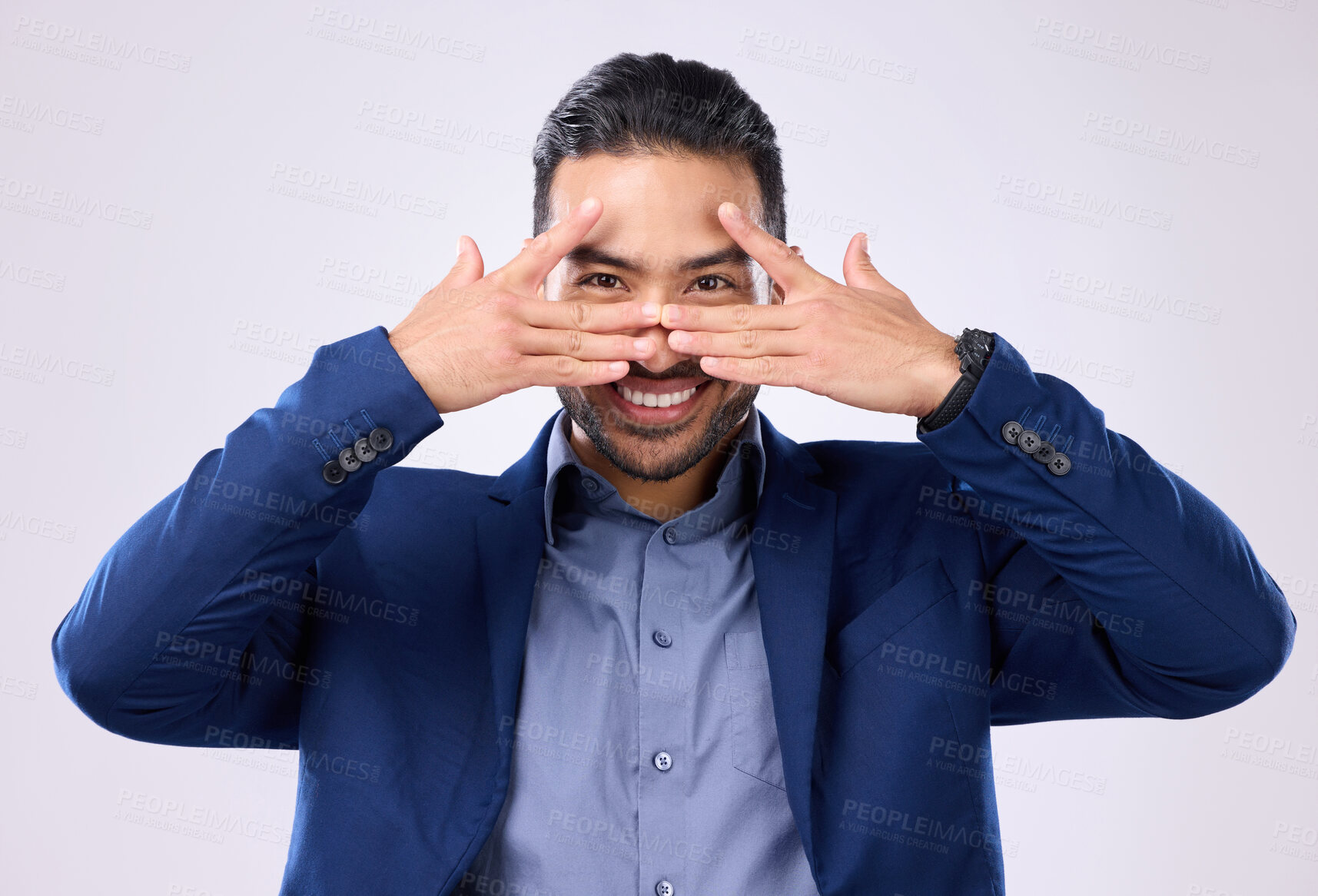 Buy stock photo Asian man, business and hands for eyes and smile in studio for motivation and pride while peeking. Happy male model portrait isolated on a gray background as corporate leader with a positive mindset