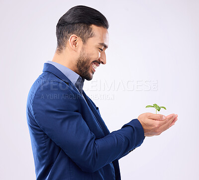 Buy stock photo Happy man, plant in hands and business growth isolated on a white background in eco friendly investment. Asian person  with sapling soil in palm for sustainable startup and green investing in studio