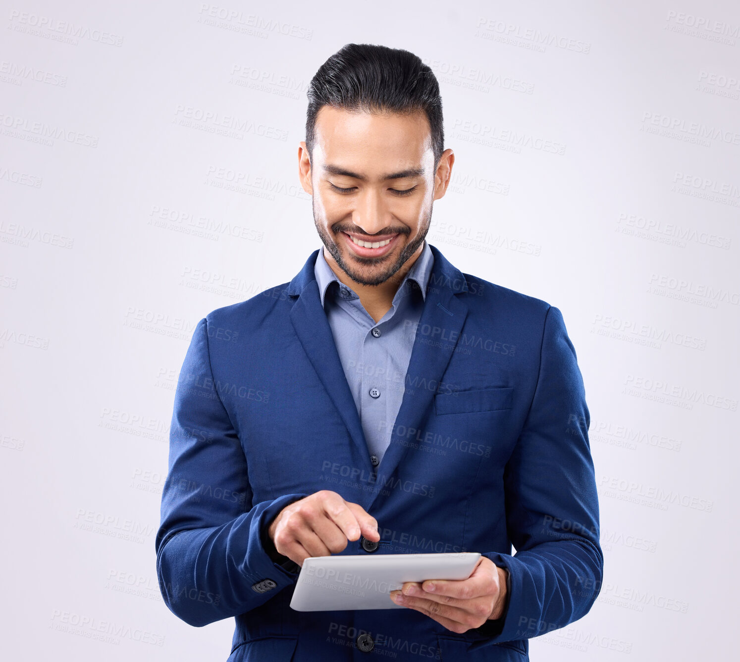 Buy stock photo Asian man, business and tablet in studio for communication and network connection. Happy male model isolated on a gray background with tech for mobile app, online chat and typing search on internet