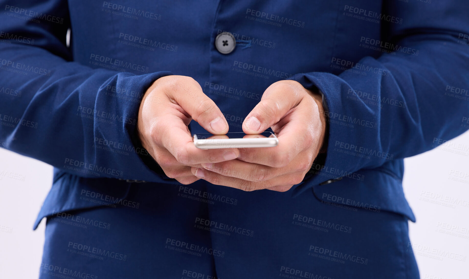 Buy stock photo Phone in hands, typing and man in studio for communication with network connection on social media. Hand of male with smartphone for internet search, mobile app and online chat on a white background 