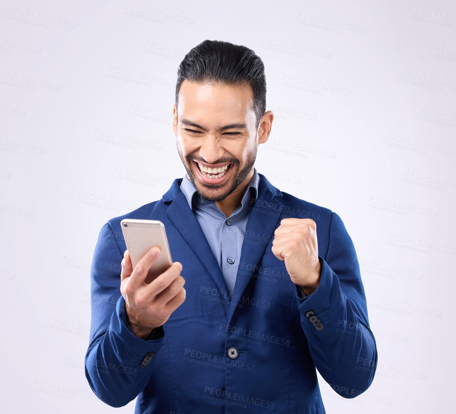 Buy stock photo Business man, phone and celebrate success in studio for winning, deal or bonus. Happy male model isolated on gray background with smartphone for mobile app or internet competition or lottery winner 