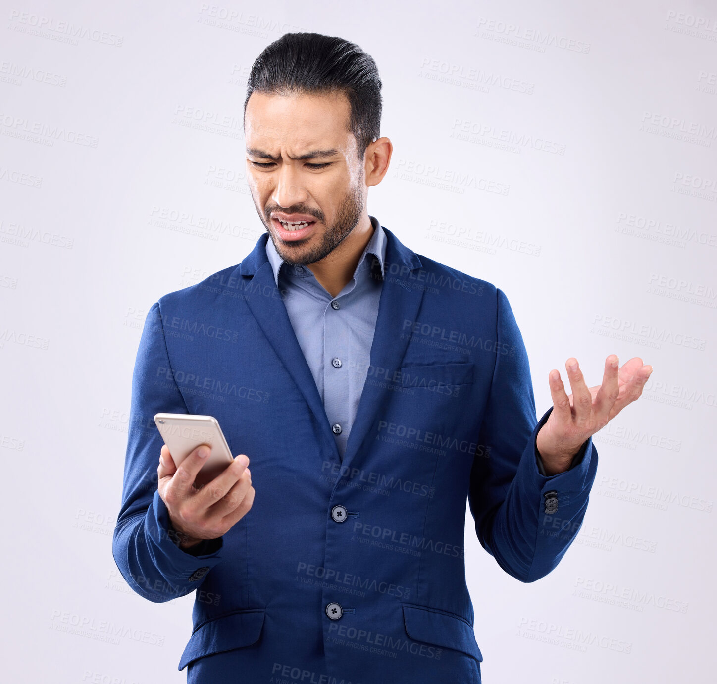 Buy stock photo Employee, smartphone and Asian man with stress, glitch and connection issue against studio background. Male entrepreneur, consultant or ceo with cellphone, problems or online reading with frustration