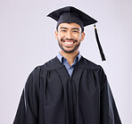 Graduation portrait of asian man isolated on studio background for education, college success or achievement. Happy face of young philippines student, scholarship person or university graduate smile