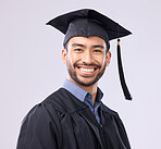 Smile, graduation and portrait of man in studio for education, college and academic success. Happy, award and study with student isolated on white background for university , degree and scholarship