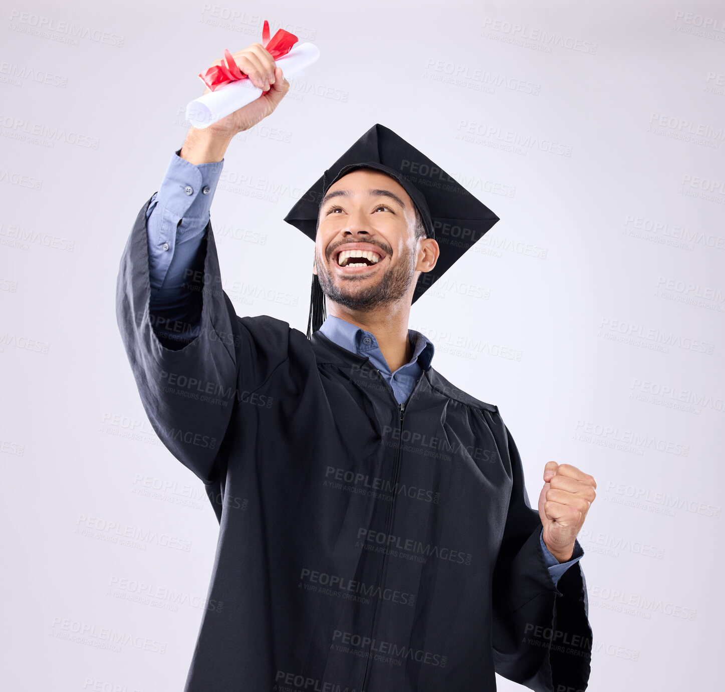 Buy stock photo Student man, celebration and diploma in studio with happiness, success and achievement of life goals. Asian guy, happy and certificate for graduation from college, university or academy with smile