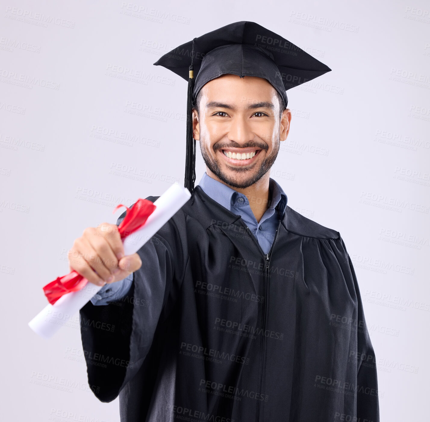 Buy stock photo Graduate man, studio portrait and diploma in hand for learning achievement, education or goal by background. Happy student, certificate or smile for success, award and excited for college graduation