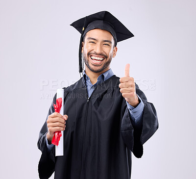 Buy stock photo Graduation man, diploma and thumbs up in studio portrait for achievement, education or goals by background. Happy student, certificate or smile for success, award or excited graduate with celebration