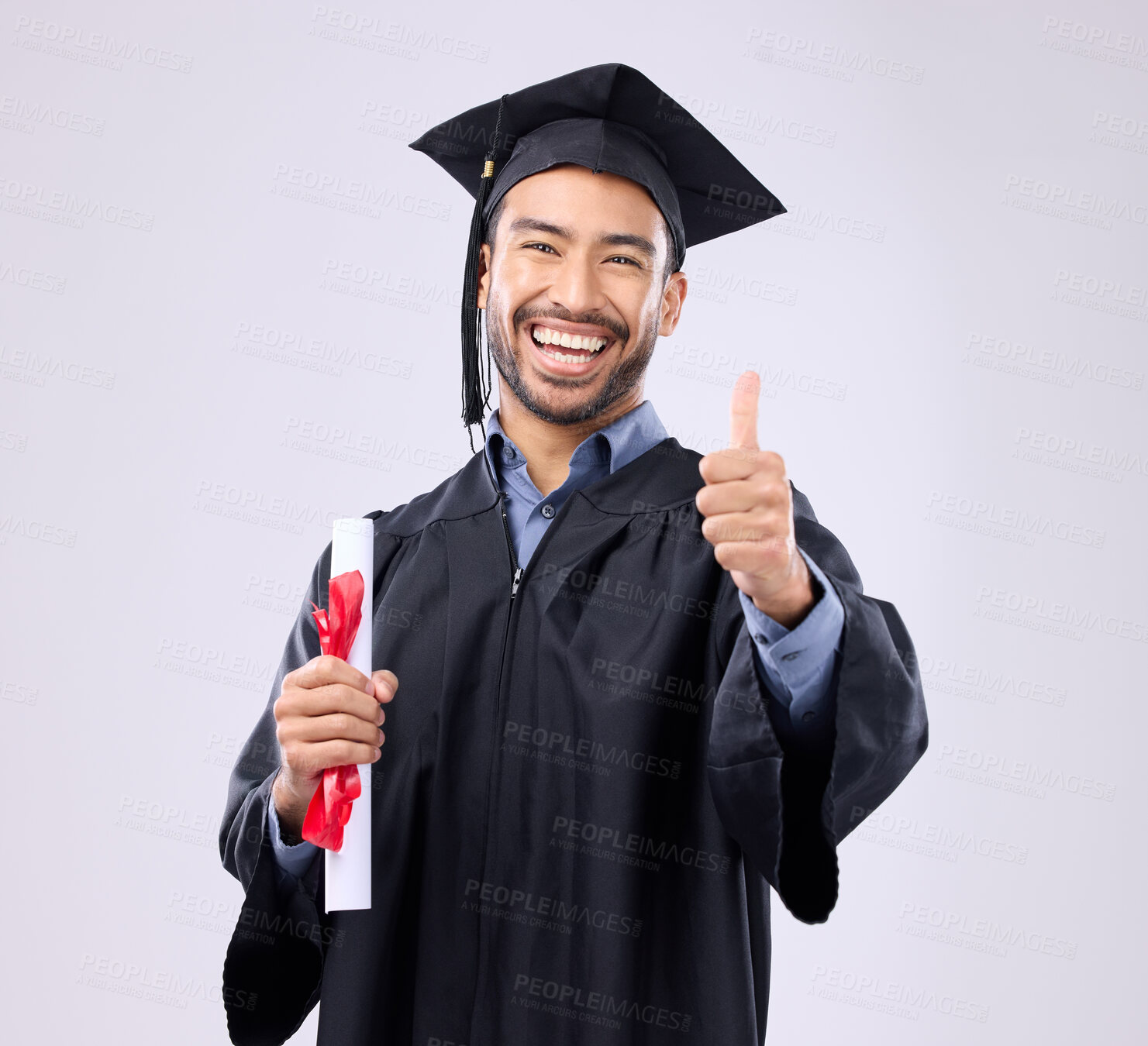 Buy stock photo Graduation man, diploma and thumbs up in studio portrait for achievement, education or goals by background. Happy student, certificate or smile for success, award or excited graduate with celebration