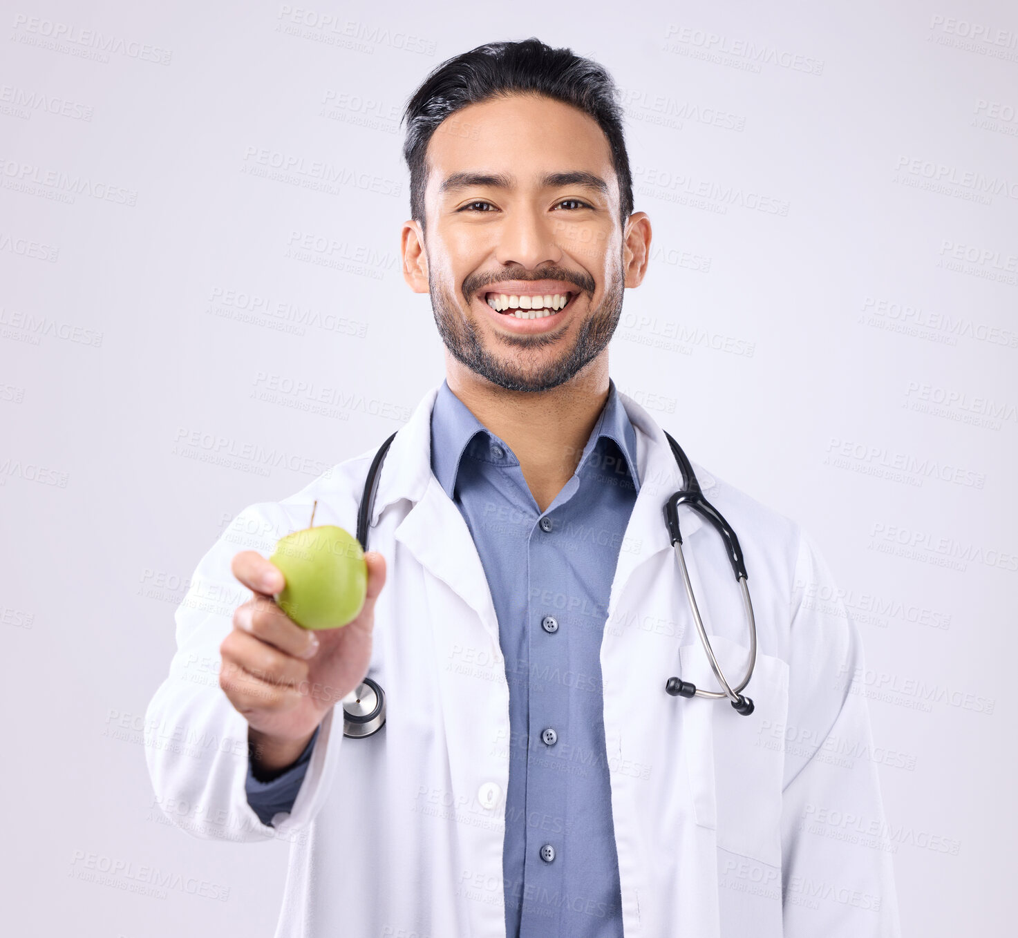 Buy stock photo Apple, doctor portrait and man happy with fruit recommendation for weight loss diet, medical healthcare or detox. Wellness, nutritionist nurse and male vegan giving food isolated on gray background