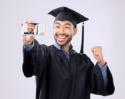 Buy stock photo Asian man, selfie and smile for graduation, scholarship or diploma against a white studio background. Happy male graduate smiling for profile picture, vlog or photo in memory of milestone achievement