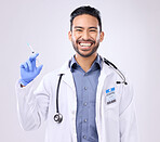 Healthcare portrait, happy man or doctor with syringe, needle or vaccine injection for covid 19, monkeypox or disease. Medical studio, hospital nurse or science innovation medicine on grey background