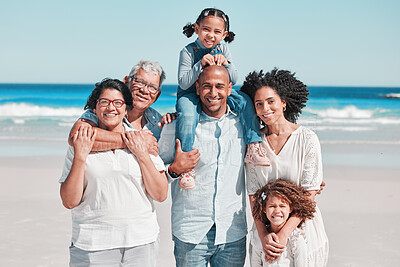 Buy stock photo Big family, smile and portrait at beach on vacation, bonding and care with piggyback. Holiday relax, summer ocean and happy father, mother and children, girls or grandparents enjoying time together.