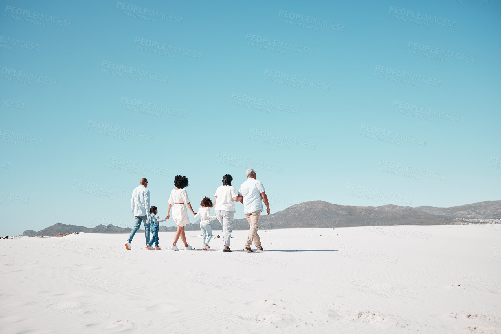 Buy stock photo Mother, dad and children with grandparents on beach to relax on summer holiday, vacation and weekend. Happy family, parents and back of kids, grandpa and grandma for walking, bonding and quality time