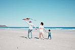 Holding hands, travel and family walking with kite together at a beach, relax and bond on ocean background. Flying, toy and couple with daughter at the sea, walk and enjoy trip in Miami with fun game