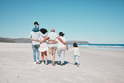 Buy stock photo Back of family on beach walking with children to relax on summer holiday, vacation and weekend together. Travel mockup, ocean and grandparents, parents and kids hug for bonding, quality time and calm