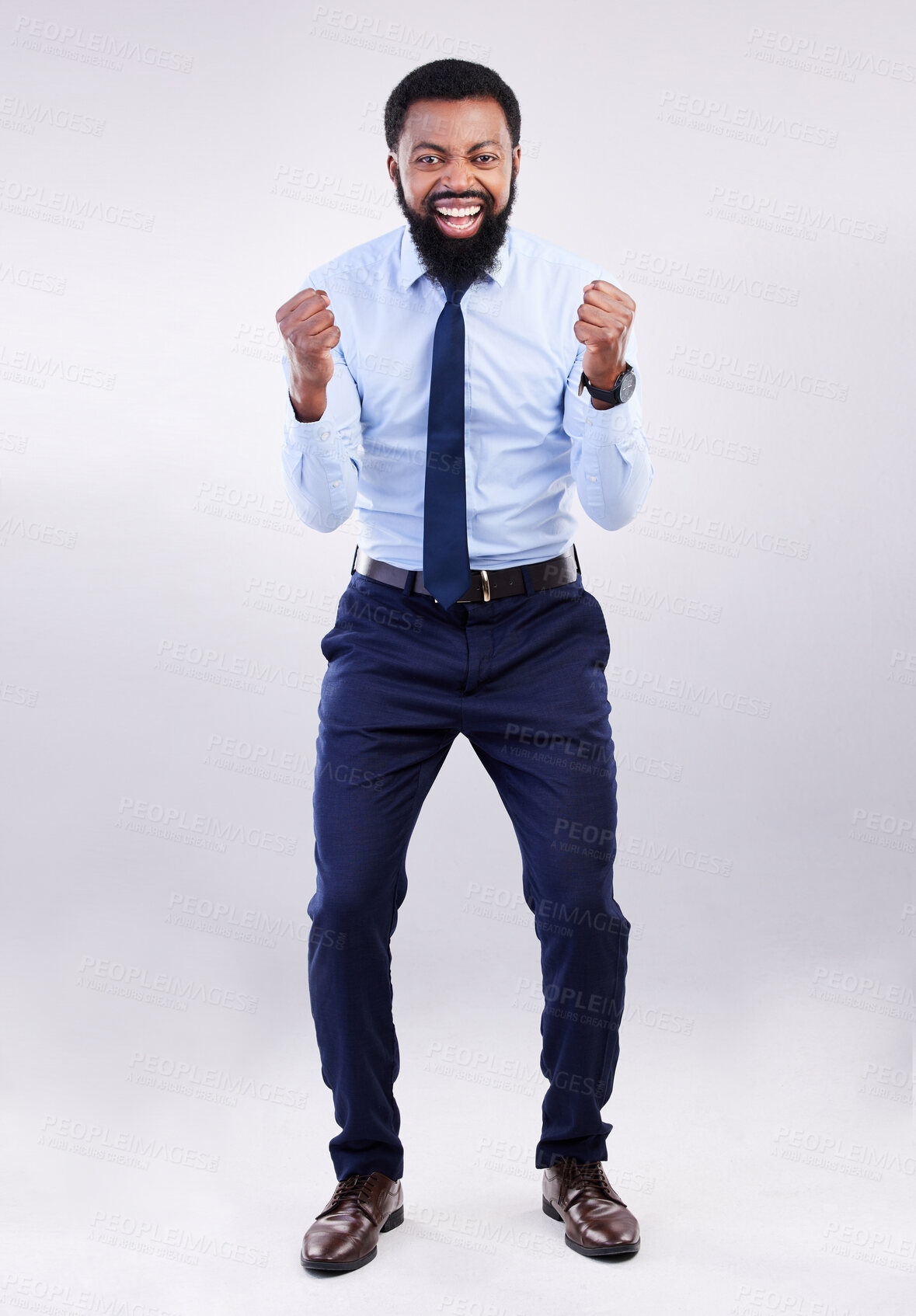 Buy stock photo Portrait, excited and black man cheering, success and happiness against a grey studio background. Face, African American male employee and happy ceo with joy, achievement and gesture for celebration