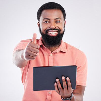 Buy stock photo Thumbs up portrait, tablet or happy black man with emoji gesture for congratulations, job well done or winner. Agreement, finance results or studio person with yes sign for success on grey background