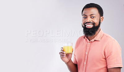 Buy stock photo Orange juice, studio portrait and happy black man with drink glass for hydration, liquid detox or weight loss beverage. Vitamin C benefits, male nutritionist diet or person on mockup gray background