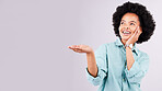 Mockup, product placement and black woman with hands in studio for advertising, marketing and branding. Happy, smile and isolated girl with gesture on white background for show, choice and promotion