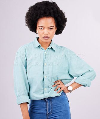 Buy stock photo Portrait, serious and black woman in studio, assertive and empowered posing against white background. Face, confident and young female with attitude, fierce or focus mindset while standing isolated
