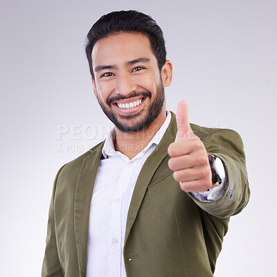 Buy stock photo Thumbs up, success and portrait of business man smile and happy for win isolated in a studio white background. Entrepreneur, Latino and corporate employee excited, thank you and agreement sign