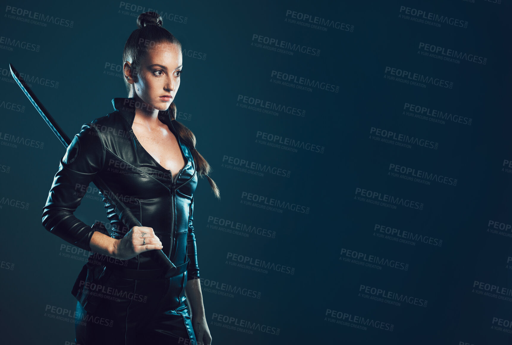 Buy stock photo Woman, sword and assassin costume in studio with mock up space for action, movie promo or branding. Girl, blade and mockup for logo, brand and promotion with model ninja, danger and future aesthetic